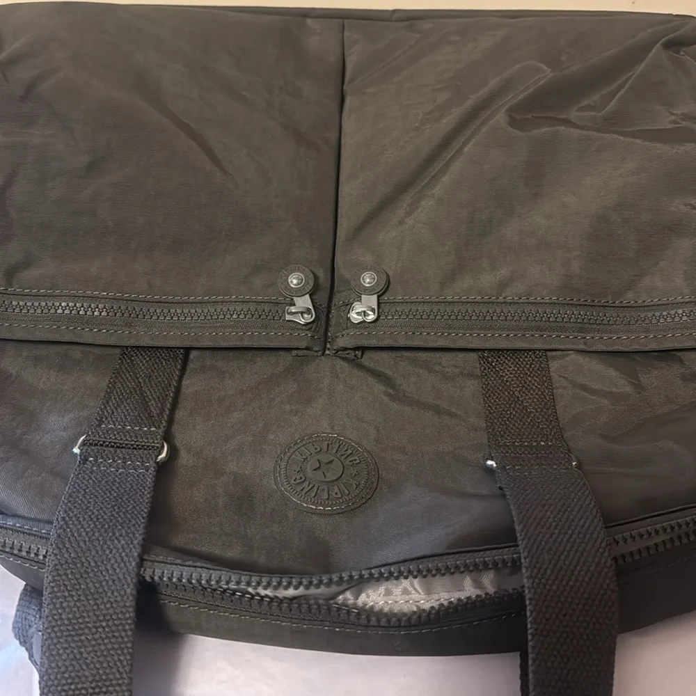 Kipling Black Duffel Bag, new, outside pockets, inside pockets, unisex